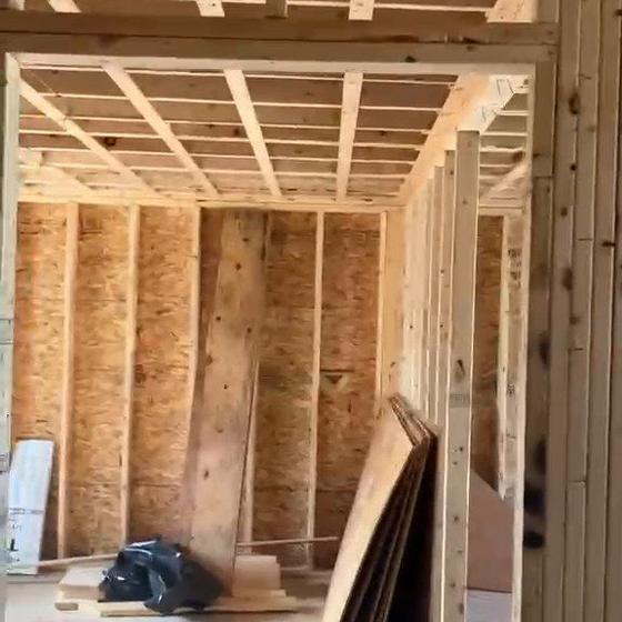 Ceiling joists over sheathed walls