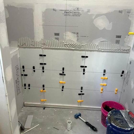Shower walls waterproofed before tiling