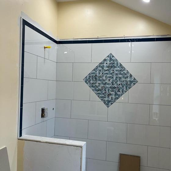 Shower niche and a tile accent diamond